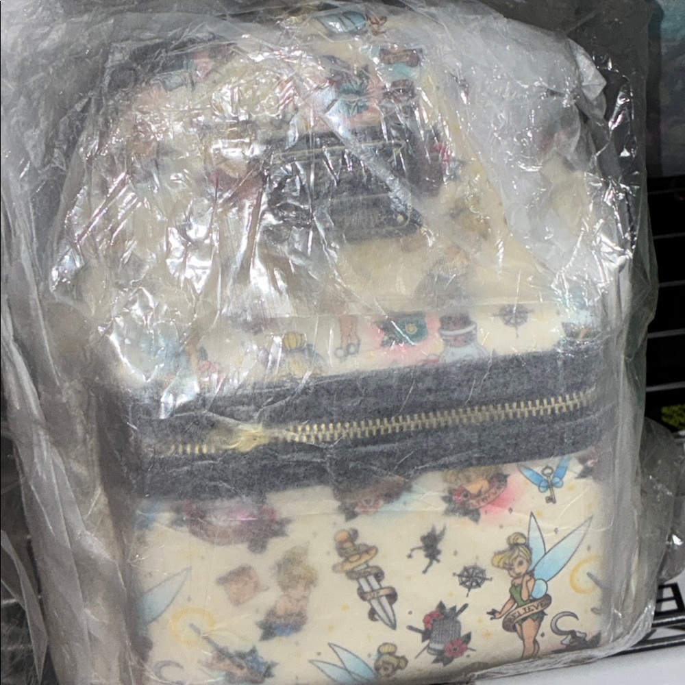 (Perfect placement) Tinkerbell Tattoo loungefly backpack